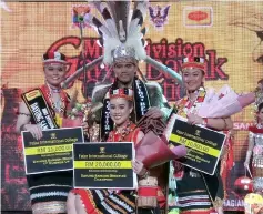  ??  ?? Emillia, flanked by Audry (left) and Engelina in this photo-call. Standing behind the Dayung Bidayuh Sangon winner is Jacob.