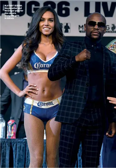  ?? Photo: GETTY IMAGES ?? BLATANT SEXISM: Mayweather and Mcgregor pose for the camera alongside girls in bikinis