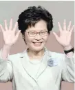  ?? — AFP ?? Hong Kong’s new chief executive Carrie Lam waves after she won the Hong Kong chief executive election in Hong Kong on Sunday.