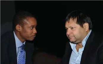 ?? PICTURE: CHRIS COLLINGRID­GE/AFRICAN NEWS AGENCY (ANA) ARCHIVES ?? President Jacob Zuma’s son Duduzane Zuma and Ajay Gupta share a private moment at the launch of the new news channel ANN7 which took place live at the Sandton Convention Centre in 2013.