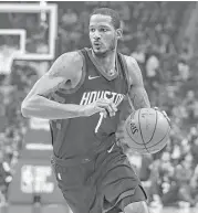  ?? Elizabeth Conley / Houston Chronicle ?? Despite a sore left foot, forward Trevor Ariza was out on the court as usual Wednesday night doing anything and everything that the Rockets required.