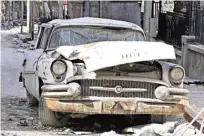  ??  ?? A 1955 Buick Super parked outside the home of Mohammad Mohiedine Anis.