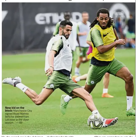  ?? — AP ?? New kid on the block: Manchester City signed Riyad Mahrez (left) for £60mil from Leicester in the close season. .