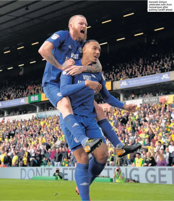  ??  ?? Kenneth Zohore celebrates with Aron Gunnarsson after putting Cardiff ahead