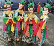  ?? Georgina Cruz / Tribune News Service ?? Dancers greet Holland America’s Amsterdam cruise ship in Indonesia’s port of Jakarta.