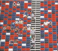  ?? John Bazemore / Associated Press ?? Fans dot the stands prior to Sunday’s NASCAR race at Talladega Superspeed­way.