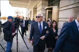  ?? DOUG MILLS — THE NEW YORK TIMES ?? Roger Stone, President Trump’s former campaign adviser, leaves federal court in Washington in 2019. He was among the group of convicted Trump loyalists to receive presidenti­al pardons Wednesday.