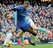 ?? AP ?? Bernardo Silva (right) of Manchester City challenges for the ball with Chelsea’s Antonio Rudiger during their English Premier League match at the Etihad Stadium in Manchester, England, on Sunday. City won 1-0. —