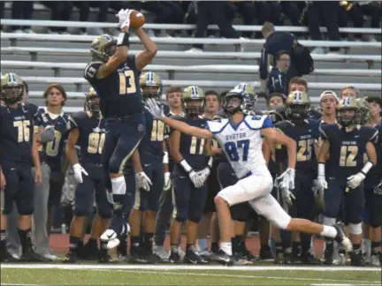  ?? BARRY TAGLIEBER - FOR DIGITAL FIRST MEDIA ?? Spring-Ford’s Blaize Scarcelle jumps high over Exeter’s Joe Rohrbach for a catch Friday.