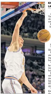  ?? Anthony J. Causi ?? OVER & OUT: Kristaps Porzingis throws down a dunk for two his 37 points during the Knicks’ 113-109 overtime victory against Lonzo Ball (left) and the Lakers at Madison Square Garden on Tuesday.