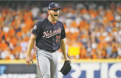  ?? MATT SLOCUM/ASSOCIATED PRESS ?? Nationals starting pitcher Stephen Strasburg reacts after an out in the sixth inning of Game 2 of the World Series against the Astros on Wednesday in Houston. Washington won 12-3 to take a 2-0 series lead.