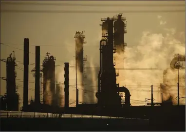  ??  ?? Emissions rise from the Royal Dutch Shell Norco Refinery in Norco, La., in June. (Bloomberg/Luke Sharrett)