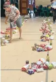  ??  ?? FOOD parcels being prepared at Camps Bay High School for needy pupils.