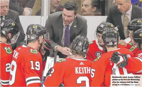  ?? NAM Y. HUH/AP ?? Blackhawks coach Jeremy Colliton picked up his first win Wednesday after the defense held the Blues at bay in a 1-0 victory.