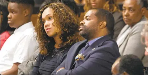  ?? JERRY JACKSON/BALTIMORE SUN ?? Baltimore State’s Attorney Marilyn Mosby and Delegate Nick Mosby listen to the Rev. Jesse Jackson at the 28th annual Civil Rights Breakfast on Sept. 27, 2019, at the War Memorial Building.