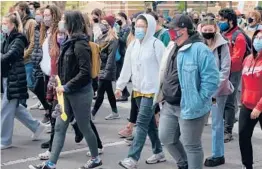  ?? JEFF DEAN/GETTY-AFP ?? Students and demonstrat­ors march Wednesday on the campus of Ohio State University to protest the killing of 16-year-old Ma’Khia Bryant by police in Columbus.