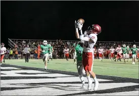  ?? MICHAEL P. PAYNE - FOR THE NEWS-HERALD ?? Chardon’s Brady Toth hauls in a touchdown pass Sept. 27at Mayfield.