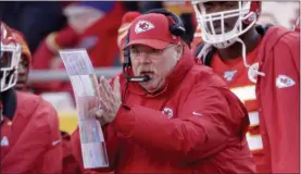  ?? CHARLIE RIEDEL — THE ASSOCIATED PRESS ?? Kansas City Chiefs head coach Andy Reid calls a play during the first half of the AFC Championsh­ip Game Sunday. Reid is headed back to the Super Bowl thanks to a 35-24 win over Tennessee.