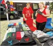  ?? LISA MITCHELL - DIGITAL FIRST MEDIA ?? Robyn Beam, Muhlenberg, of The Faerie Garbmother, and her son Aidan, 18, sold hats at NomFest.