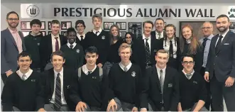  ?? WEST ISLAND COLLEGE ?? West Island College incorporat­es its alumni in school life in several ways. Here graduates Chris Ghersinich, far left, Lee Farrier, back row, seventh from the left, and Scott Yester, right, joined senior students for a Mentoring 101 session.