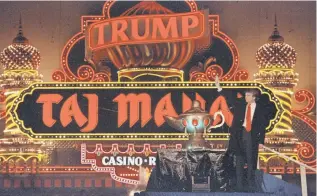  ?? MIKE DERER, AP ?? Donald Trump’s Atlantic City casino had troubles in the 1990s, when the Treasury Department fined the company for not reporting gamblers who cashed out more than $10,000 in a single day.