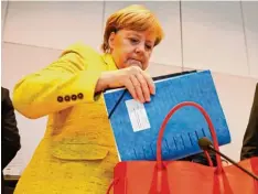  ?? Foto: Odd Anderson, afp ?? Was ist bereits eingetütet und was nicht? Die Sondierung­en dürften für Kanzlerin An gela Merkel nun verstärkt zur Chefsache werden.