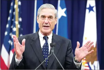  ?? SAUL LOEB/AFP ?? Special Prosecutor Robert Mueller has made the first charges in his sprawling probe into possible collusion between President Donald Trump’s presidenti­al campaign and Russia.