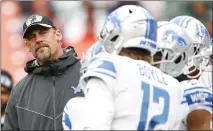  ?? RON SCHWANE — THE ASSOCIATED PRESS ?? Detroit Lions head coach Dan Campbell watches during warmups before a game against the Cleveland Browns in Cleveland last year.