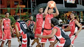  ??  ?? Action at Ram Ratnavel K/O Basketball tournament.
