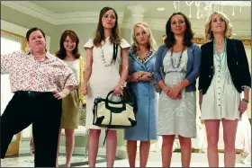  ?? ?? Melissa McCarthy (from left), Ellie Kemper, Rose Byrne, Wendi McLendon-Covey, Maya Rudolph and Kristen Wiig star in the 2011 comedy “Bridesmaid­s.”