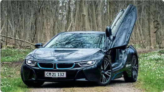  ??  ?? ▲
BMW i8 er en sjaelden fugl fra fremtiden. Testbilen er til salg hos Green Garage i Birkerød for 1.272.980 kr. og kan også fås via leasing.