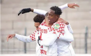  ?? Agence France-presse ?? ↑
Mainz’s Jean-philippe Mateta (right) celebrates after scoring a goal against Freiburg during their German League match on Sunday.