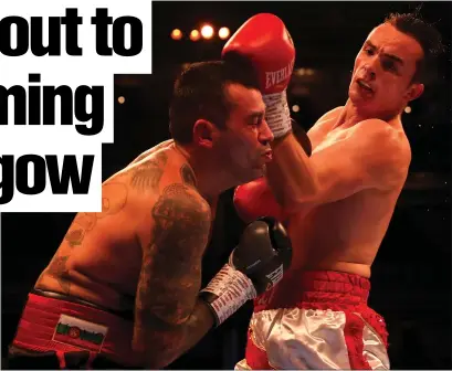  ??  ?? Willy Hutchinson (right) lands a blow on Georgi Georgiev during his victory at the Royal Albert Hall