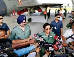  ??  ?? (TOP TO ABOVE) GARUD COMMANDOS IN ACTION; MASS CASUALTY AIR EVACUATION DRILL IN PROGRESS; DEFENCE MINISTER WITH AIR CHIEF ADDRESS THE MEDIA IN CHABUA, ASSAM, DURING GAGAN SHAKTI 2018.