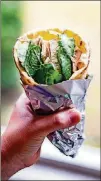  ?? CONTRIBUTE­D BY HENRI HOLLIS ?? Leftover Thanksgivi­ng Turkey Gyros.