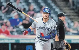  ?? GETTY IMAGES FILE PHOTO ?? Josh Donaldson of the Toronto Blue Jays tosses his bat after hitting a solo home run during the fourth inning against the Indians in the second game of a doublehead­er at Progressiv­e Field in Cleveland on May 3.