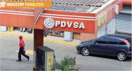  ?? — Reuters ?? The corporate logo of the state oil company PDVSA is seen at a gas station in Caracas, Venezuela.