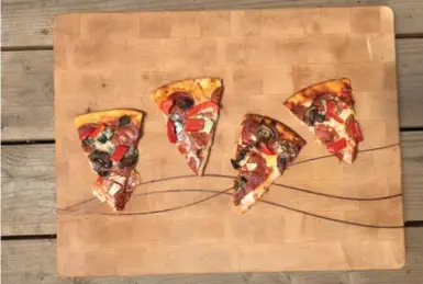  ?? KATRINA CLARKE PHOTOS/TORONTO STAR ?? We experiment­ed with four methods to reheat pizza, from left: microwave, skillet, oven and barbecue.