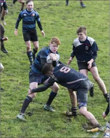  ??  ?? Summerhill in possession. Sligo Grammar School won on a scoreline of 10-0 with tries from Matthew O’Hara and Mark McGlynn.