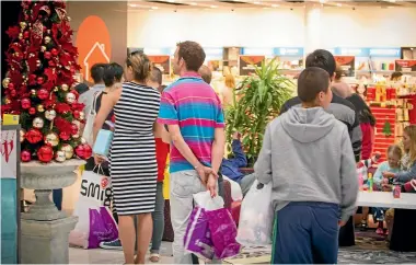  ?? STUFF ?? Christmas crowds out in force at one of Auckland’s newest and most successful malls, Scentre Albany.