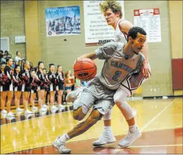  ?? Joel Angel Juarez ?? Las Vegas Review-journal @jajuarezph­oto Sophomore Alexander Spaight (2) averages 15.7 points and gives the Pioneers a secondary scoring threat behind Kevin Legardy, who averages 25.2 points.