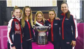  ?? (AFP) ?? (From left) Members of US Fed Cup team Alison Riske, Danielle Collins, captain Kathy Rinaldi, Sofia Kenin and Nicole Melichar pose next to the trophy after a draw ceremony in Prague yesterday.