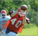  ?? SAM STEWART — DIGITAL FIRST MEDIA ?? Perkiomen Valley’s Sean Owens hauls in a pass during training camp. Owens returns alongside Justin Jaworski at receiver.