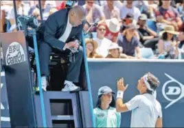  ?? AFP ?? Italian Fabio Fognini argues with the umpire after a point against Reilly Opelka of the US.