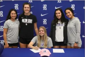  ?? Scott Herpst ?? Also joining Drew Burke for her signing this past Friday were four of her new Dalton State teammates (from left) Giselle Contri (Northwest Whitfield), Brooke Alvarez (Northwest Whitfield), Brianna Smotherman (Heritage) and Selina Vazquez (Coahulla Creek). Because of COVID restrictio­ns two years ago, Contri and Vazquez, now DSC sophomores, were unable to have signing day ceremonies themselves, so the Burke family recognized them during Friday’s event.