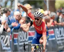  ?? JOHN COWPLAND/PHOTOSPORT ?? Tasman rider Jason Christie celebrates after winning the elite road national championsh­ips earlier this year.