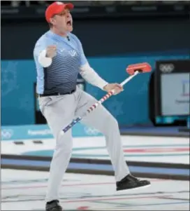  ?? NATACHA PISARENKO — THE ASSOCIATED PRESS ?? U.S. skip John Shuster reacts during the men’s final match Sweden in Gangneung, South Korea, on Saturday. against