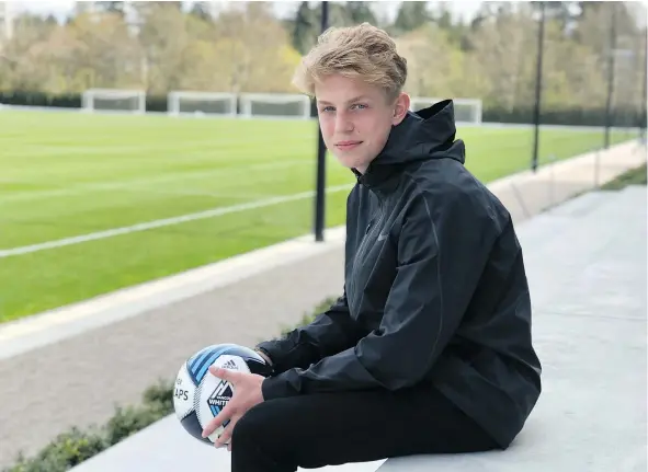  ??  ?? Simon Colyn, 16, signed a Homegrown contract with the Vancouver Whitecaps this week, making him the youngest player on the team’s active roster. The Langley native is the 15th-youngest player in league history to sign an MLS deal.