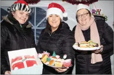  ??  ?? LEFT: Raising funds for Sliabh a’ Mhadra NS at the Ballyduff Christmas Market on Sunday were Sandra Carey, Aileen Nolan and Josephine Nelan.