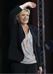  ?? KAMIL ZIHNIOGLU/THE ASSOCIATED PRESS FILE PHOTO ?? Far-right candidate Marine Le Pen uses dark suits to go with her message.